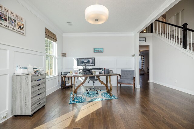 office space featuring dark hardwood / wood-style flooring and crown molding