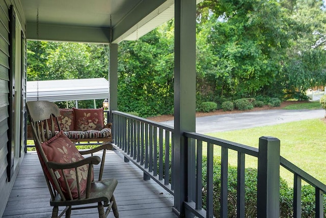 134 Robin Rd, Barnwell, SC 29812 - wooden porch with a lawn