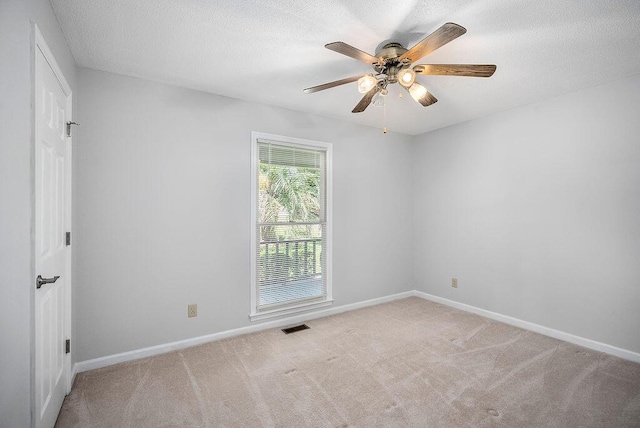 134 Robin Rd, Barnwell, SC 29812 - carpeted empty room featuring ceiling fan and a textured ceiling