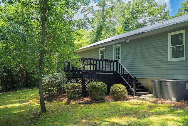 134 Robin Rd, Barnwell, SC 29812 - rear view of house featuring a lawn, a wooden deck, and a metal roof