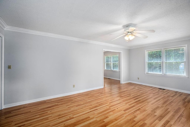 134 Robin Rd, Barnwell, SC 29812 - empty room featuring ceiling fan, a textured ceiling, light wood-style floors, and crown molding