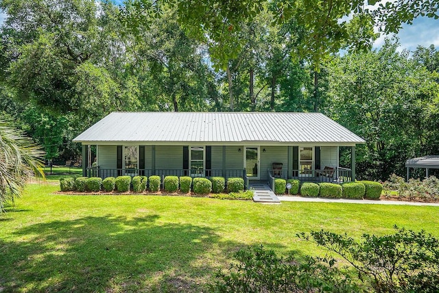 134 Robin Rd, Barnwell, SC 29812 - view of front of property featuring covered porch, a front lawn, and a metal roof