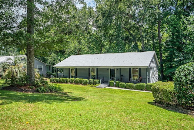 134 Robin Rd, Barnwell, SC 29812 - ranch-style home featuring covered porch, a front lawn, and a metal roof