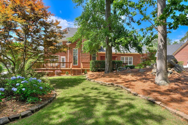 3501 Lonesome Pine Ct, Martinez, GA 30907 - rear view of house with a wooden deck, brick siding, and a lawn