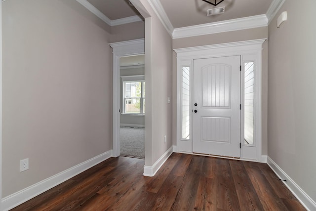 foyer entrance featuring dark wood-style floors, baseboards, and crown molding