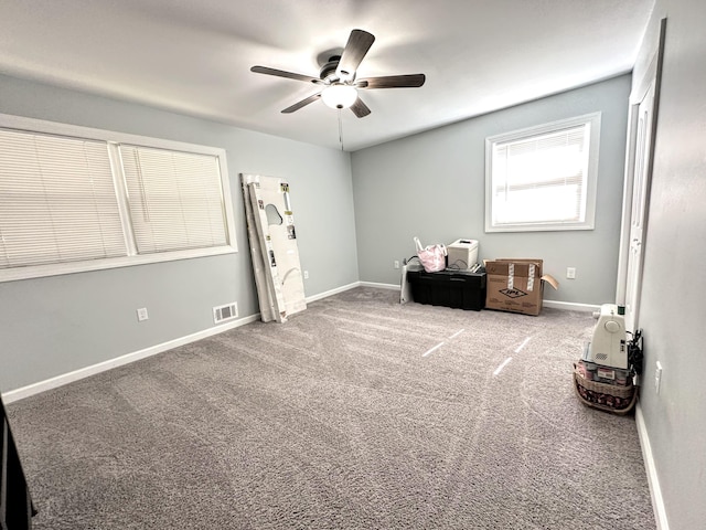 1735 Goshen Rd, Augusta, GA 30906 - carpeted bedroom with visible vents, baseboards, and a ceiling fan