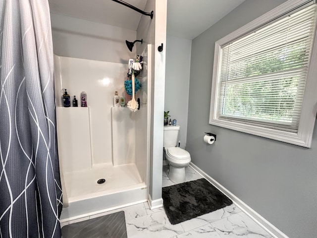 1735 Goshen Rd, Augusta, GA 30906 - full bath with a shower stall, marble finish floor, baseboards, and toilet