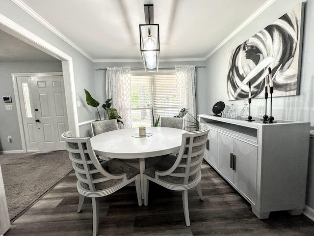 1735 Goshen Rd, Augusta, GA 30906 - dining area featuring baseboards, dark wood finished floors, and crown molding