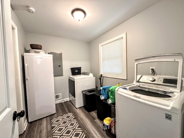1735 Goshen Rd, Augusta, GA 30906 - laundry room with laundry area, visible vents, electric panel, separate washer and dryer, and dark wood-style floors