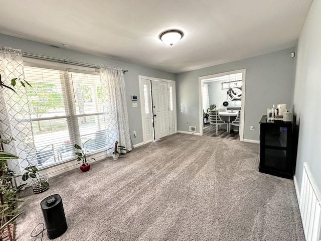 1735 Goshen Rd, Augusta, GA 30906 - carpeted foyer entrance with baseboards and visible vents