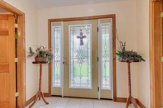 entryway with light tile patterned floors