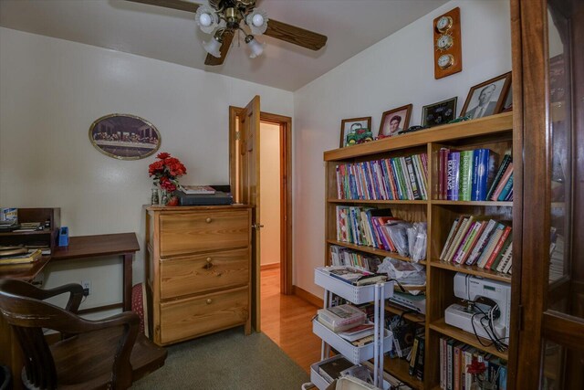 office featuring light wood-type flooring, ceiling fan, and lofted ceiling