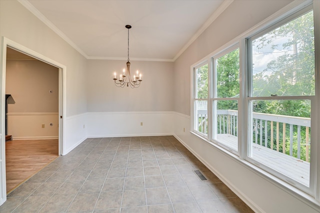 227 Water Oak Dr, Augusta, GA 30904 - spare room featuring a chandelier, crown molding, and light tile patterned floors