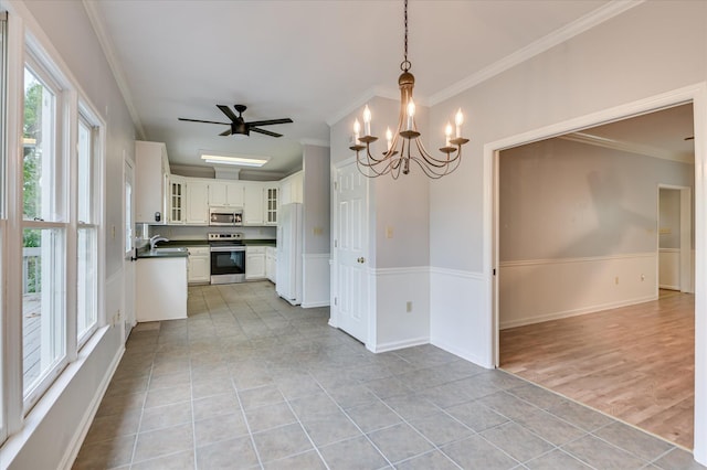 227 Water Oak Dr, Augusta, GA 30904 - unfurnished dining area featuring ornamental molding, a chandelier, light tile patterned floors, a ceiling fan, and a wainscoted wall