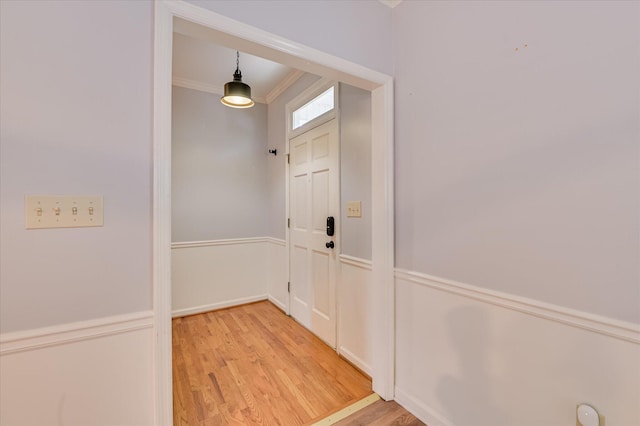 227 Water Oak Dr, Augusta, GA 30904 - doorway with light wood-style flooring and crown molding