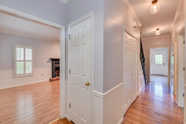 227 Water Oak Dr, Augusta, GA 30904 - hallway featuring ornamental molding, light wood-style floors, and plenty of natural light