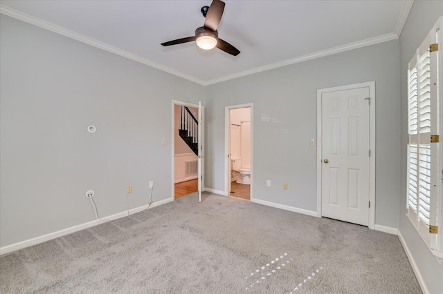 227 Water Oak Dr, Augusta, GA 30904 - unfurnished bedroom with carpet flooring, ornamental molding, multiple windows, ensuite bath, and a ceiling fan