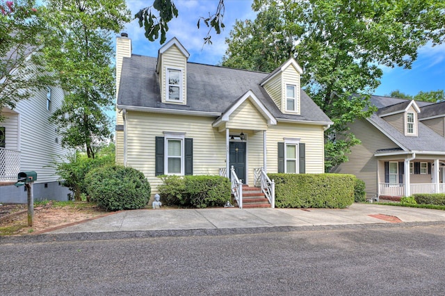 227 Water Oak Dr, Augusta, GA 30904 - cape cod house featuring a chimney