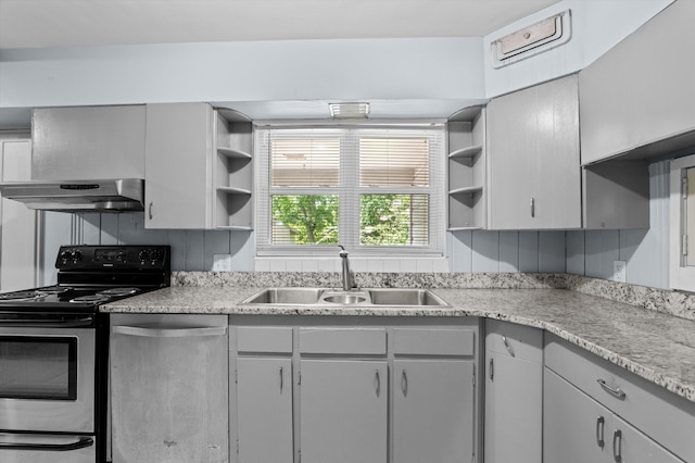 2203 Crestwood Dr, Augusta, GA 30904 - kitchen featuring appliances with stainless steel finishes, open shelves, light countertops, and under cabinet range hood