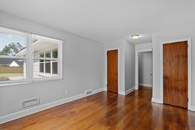 2203 Crestwood Dr, Augusta, GA 30904 - unfurnished bedroom with wood-type flooring and baseboards