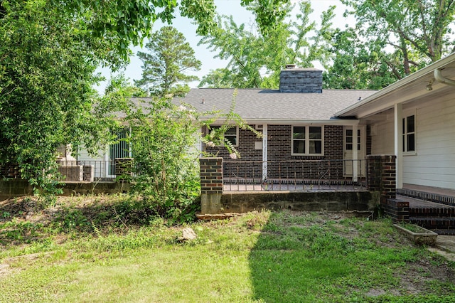 2203 Crestwood Dr, Augusta, GA 30904 - view of front facade featuring a chimney, brick siding, and a shingled roof