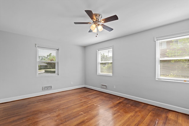 2203 Crestwood Dr, Augusta, GA 30904 - unfurnished room featuring plenty of natural light, wood finished floors, and a ceiling fan