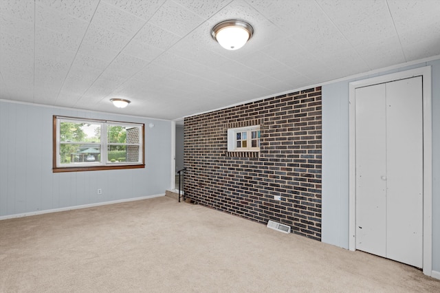 2203 Crestwood Dr, Augusta, GA 30904 - basement featuring carpet floors and brick wall