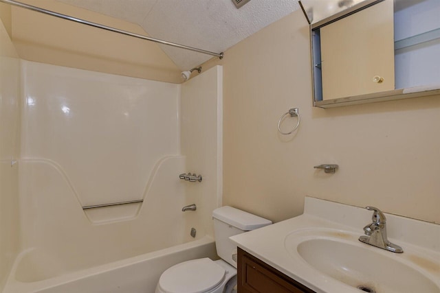 full bathroom with vanity, toilet, shower / bath combination, and a textured ceiling