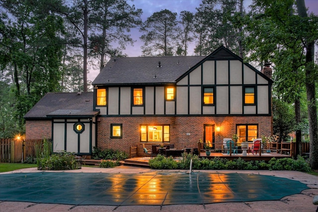 710 Somerset Way, Augusta, GA 30909 - rear view of house featuring a deck, a chimney, and brick siding