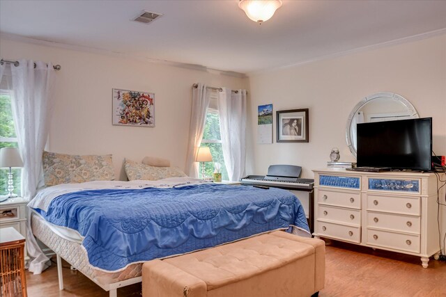 710 Somerset Way, Augusta, GA 30909 - bedroom featuring wood finished floors and crown molding