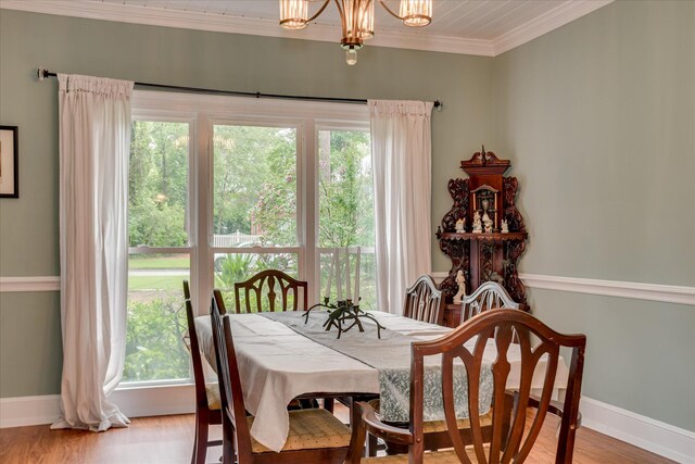 710 Somerset Way, Augusta, GA 30909 - dining area featuring a chandelier, ornamental molding, and light wood-style floors