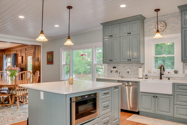 710 Somerset Way, Augusta, GA 30909 - kitchen featuring stainless steel dishwasher, gray cabinets, light wood finished floors, light countertops, and crown molding