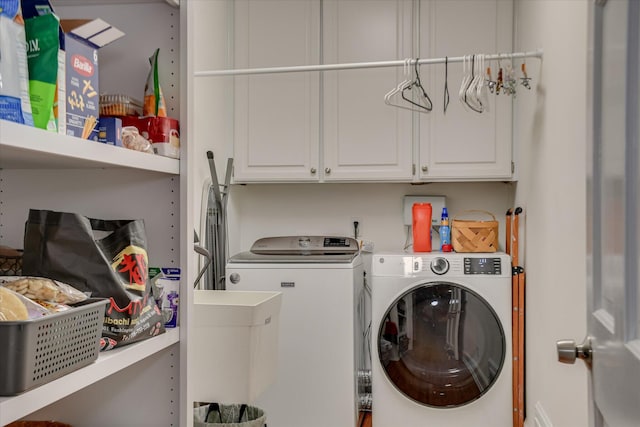 710 Somerset Way, Augusta, GA 30909 - laundry area featuring washing machine and clothes dryer and cabinet space