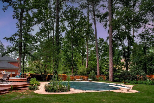 710 Somerset Way, Augusta, GA 30909 - view of swimming pool with a diving board, a deck, and a fenced backyard