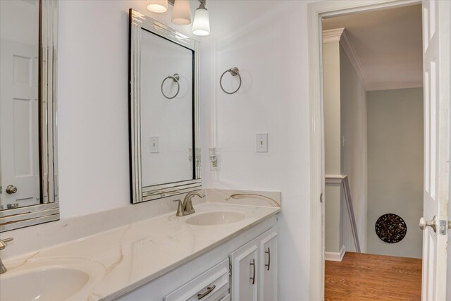 710 Somerset Way, Augusta, GA 30909 - bathroom with double vanity, ornamental molding, and wood finished floors