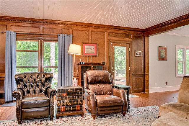 710 Somerset Way, Augusta, GA 30909 - sitting room with crown molding, wooden ceiling, wood finished floors, and wooden walls