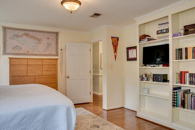 710 Somerset Way, Augusta, GA 30909 - bedroom with wood finished floors and ornamental molding