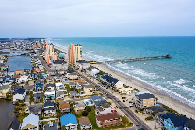aerial view featuring a water view and a view of the beach