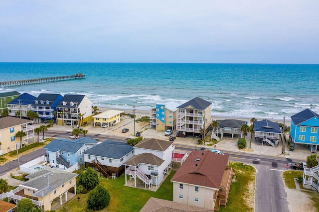 bird's eye view with a view of the beach and a water view