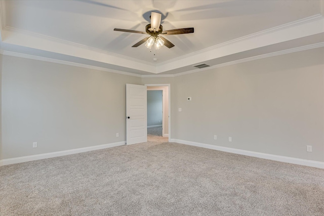 5265 Greyton Cir, North Augusta, SC 29860 - spare room with a tray ceiling, light colored carpet, ceiling fan, ornamental molding, and baseboards