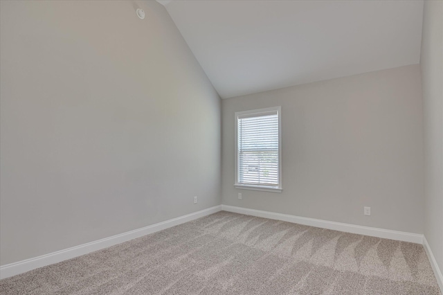 5265 Greyton Cir, North Augusta, SC 29860 - unfurnished room with vaulted ceiling, baseboards, and light colored carpet