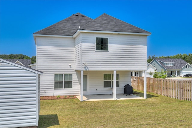 5265 Greyton Cir, North Augusta, SC 29860 - back of property with a patio area and roof with shingles
