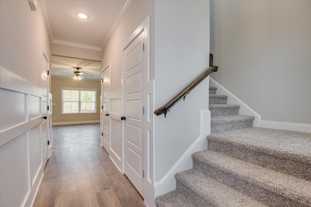 5265 Greyton Cir, North Augusta, SC 29860 - staircase with crown molding, ceiling fan, wood finished floors, baseboards, and recessed lighting
