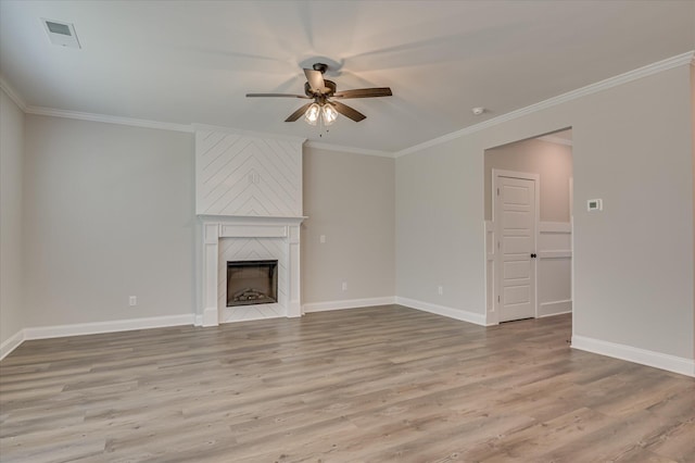 5265 Greyton Cir, North Augusta, SC 29860 - unfurnished living room featuring a ceiling fan, wood finished floors, ornamental molding, a large fireplace, and baseboards