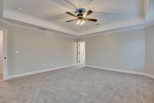 5265 Greyton Cir, North Augusta, SC 29860 - spare room with a raised ceiling, crown molding, light carpet, a ceiling fan, and baseboards