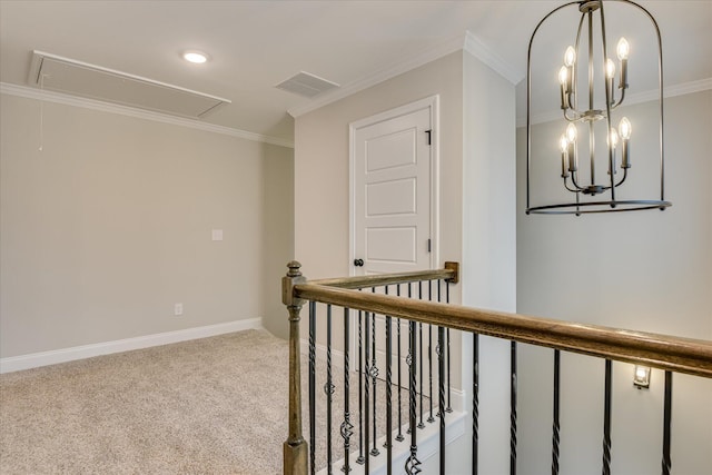 5265 Greyton Cir, North Augusta, SC 29860 - hall with attic access, ornamental molding, carpet flooring, an upstairs landing, and baseboards