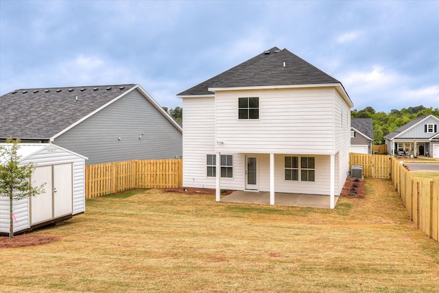 5265 Greyton Cir, North Augusta, SC 29860 - back of property with a patio area, central AC, and a shingled roof