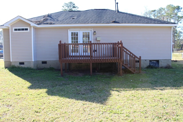 back of property with crawl space, roof with shingles, a lawn, and a wooden deck