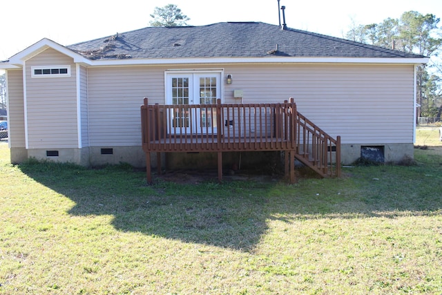 rear view of property featuring a yard, roof with shingles, crawl space, and a deck