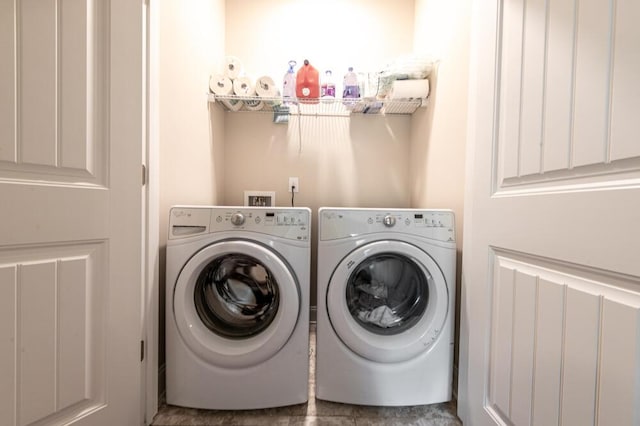 laundry area with washer and clothes dryer